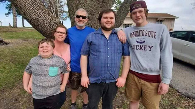 This photo provided by Nancy Sack shows Carter Lange, Kim Gustavson, Jason Lange, Matthew Gustavson and Travis Gustavson. Nancy Sack's grandson, Travis Gustavson, died at age 21 in Mankato after overdosing on what he thought was heroin but was actually laced with fentanyl.(Katie Tettam /Nancy Sack via AP)