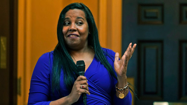 Del. Charniele Herring, D-Alexandria, gestures during the House session at the Capitol Tuesday Feb. 8, 2022, in Richmond, Va. Republicans in the Virginia House defeated measures Tuesday that would have let voters decide whether to strip legally outdated language prohibiting gay marriage from the state Constitution and automatically restore the voting rights of felons who have served their terms. (AP Photo/Steve Helber)