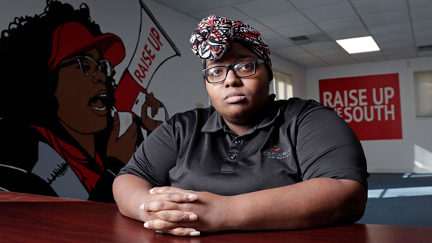 Sheree Allen poses at the Raise Up offices