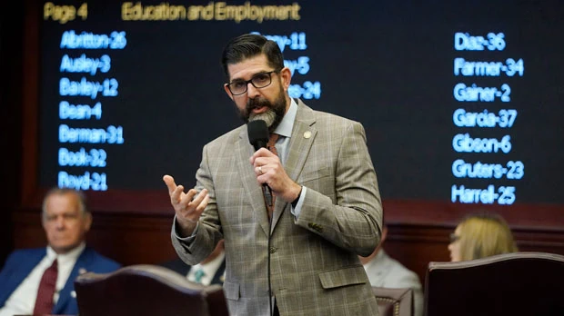 Florida Sen. Manny Diaz Jr., speaks for a bill during a legislative session at the Florida State Capitol, Thursday, March 10, 2022, in Tallahassee, Fla. (AP Photo/Wilfredo Lee)