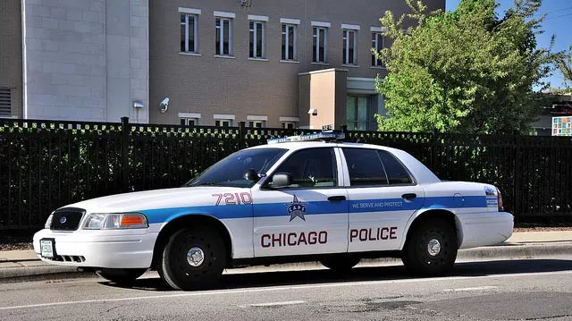 "Chicago Police Cruiser 7210" by vxla licensed under CC BY 2.0