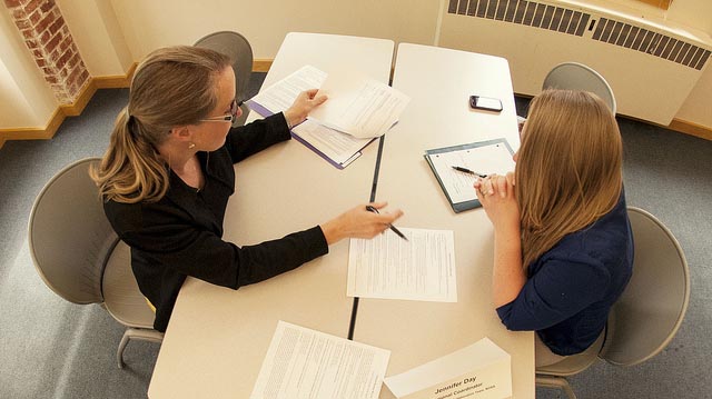 "Jennifer Day (M.S., 10), talks with Bernadette Grafton" by University of Michigan School of Natural Resources & Environment licensed under CC BY 2.0 