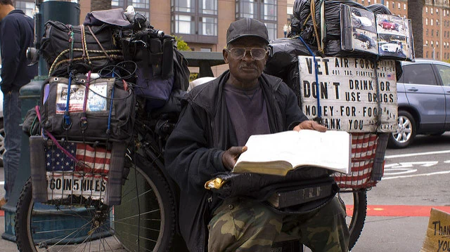 "Homeless Vet @ Ferry Building Farmer's Market" by Vera Yu and David Li licensed under CC BY 2.0