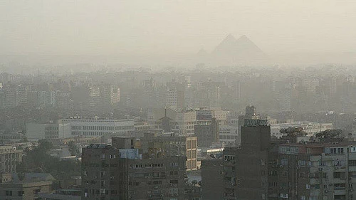 "Nina Hale" by Cairo Air Pollution with less smog - Pyramids1 licensed under CC BY 2.0