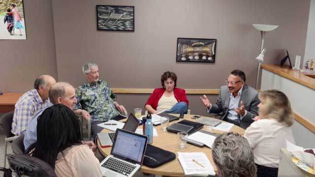 "Population Media Staff during production meeting" Photo courtesy of Population Media Center.