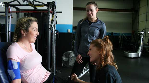 "Client and physical therapists at the gym" Photo courtesy of NeuAbility
