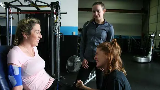 "Client and physical therapists at the gym" Photo courtesy of  NeuAbility