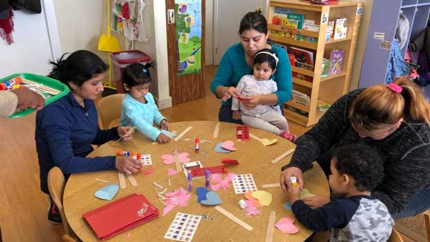 "Team working with children" Photo courtesy of Family Life Education