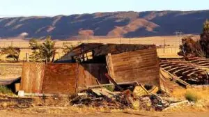 "Collapsed Barn" by Rennett Stowe licensed under CC BY 2.0