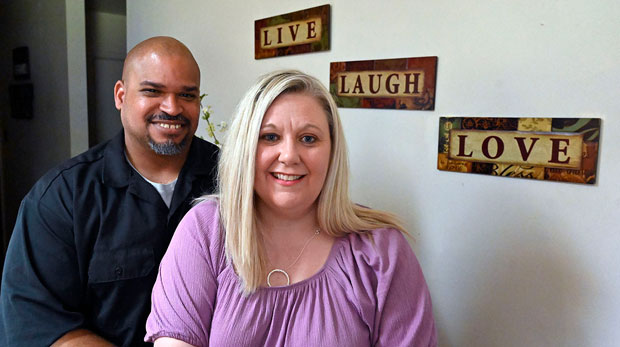 Dante Murry, left, and his wife, Chastity Murry, in their home in Elizabethtown, Ky.,
