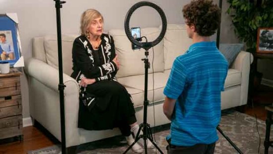 Holocaust survivor Tova Friedman, 85, prepares to record a TikTok video with her grandson, 17-year-old Aron Goodman