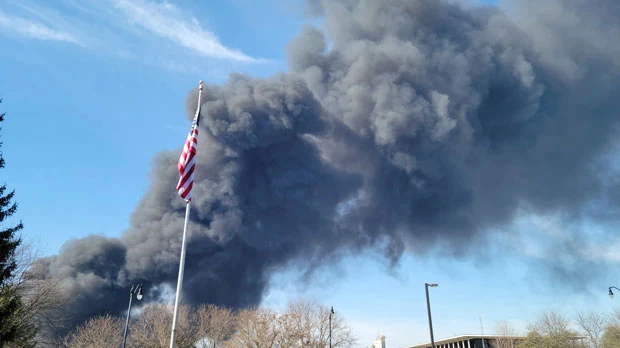 Smoke rises from an industrial fire